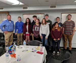 Pictured L-R: Clow Valve General Manager Mark Willett and high school graduates