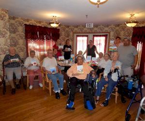 Clow Valve team members volunteer at local assisted living facility